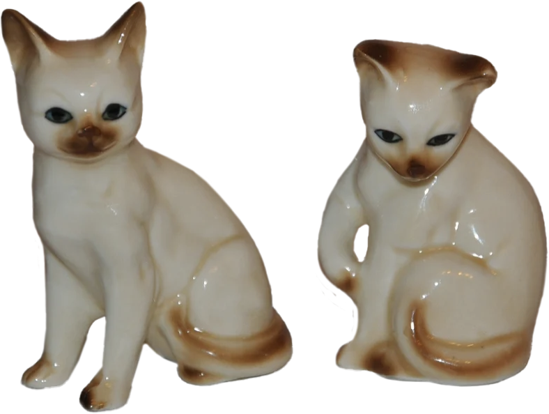 two porcelain statuettes of siamese cats